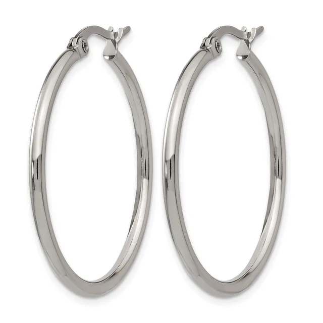 A pair of polished silver-toned hoop earrings with hinged closures, displayed against a white background.