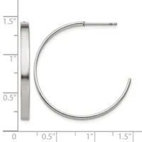 Silver-toned hoop earrings with a polished finish, shown next to a measurement scale indicating approximately 1.5 inches in diameter.