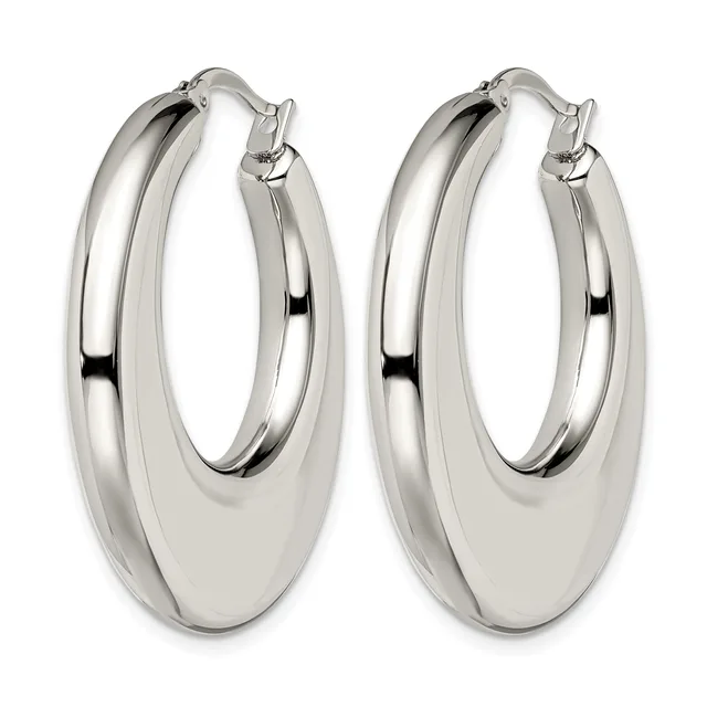 A pair of polished silver-toned chunky hoop earrings with a grooved linear detail, shown against a white background.