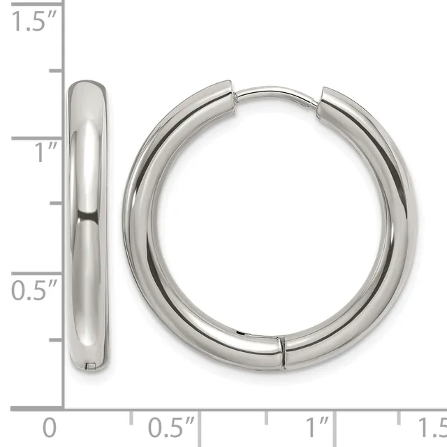 Polished silver-toned chunky hoop earrings with hinged closures, shown from front and side views with a measurement scale.