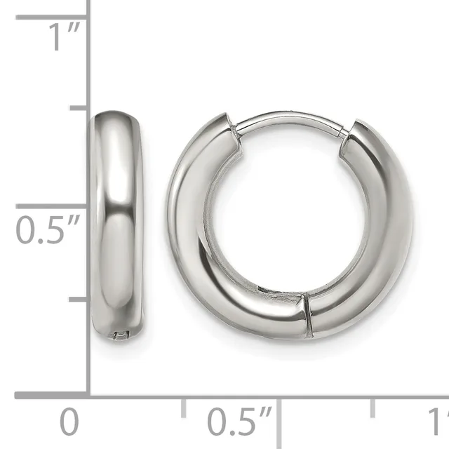 A pair of polished silver-toned chunky hoop earrings with hinged closures, shown next to a ruler indicating they measure approximately 0.5 inches wide and 1 inch in height.