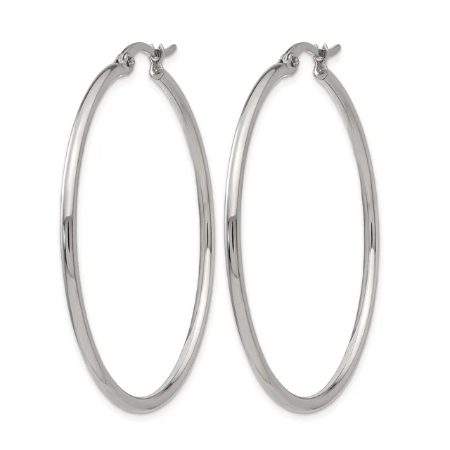 A pair of polished silver-toned hoop earrings with a smooth, rounded profile and hinged closures, displayed against a white background.