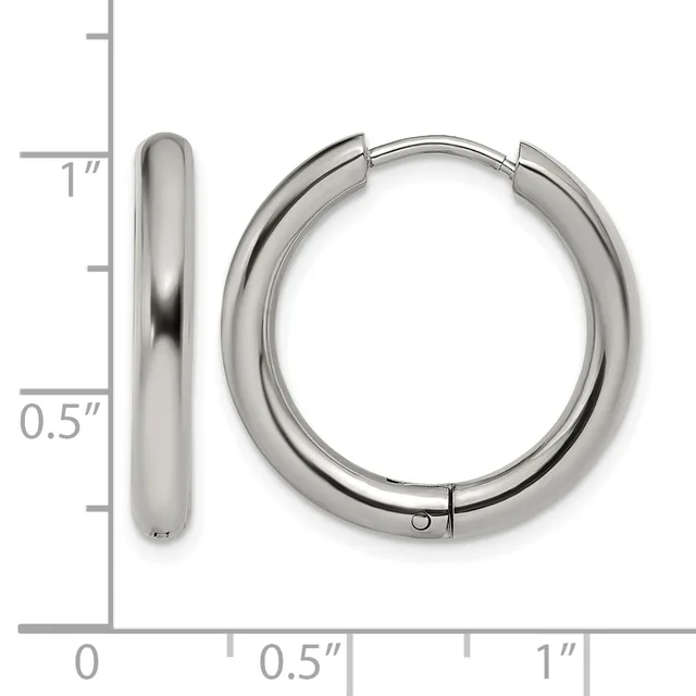 Polished stainless steel hoop earrings with a thick rounded profile, shown with a measurement scale indicating approximately one inch in diameter.