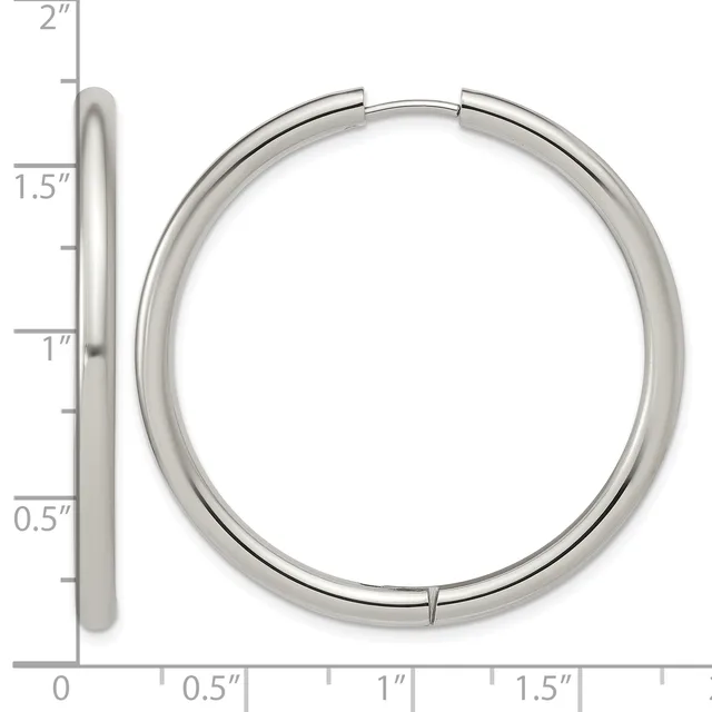 A polished silver-toned hinged bangle bracelet shown from front and side views with a measurement scale indicating approximately 1.75 inches in diameter.