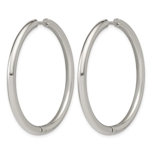 A pair of polished silver-toned hoop earrings with hinged closures, shown against a white background.