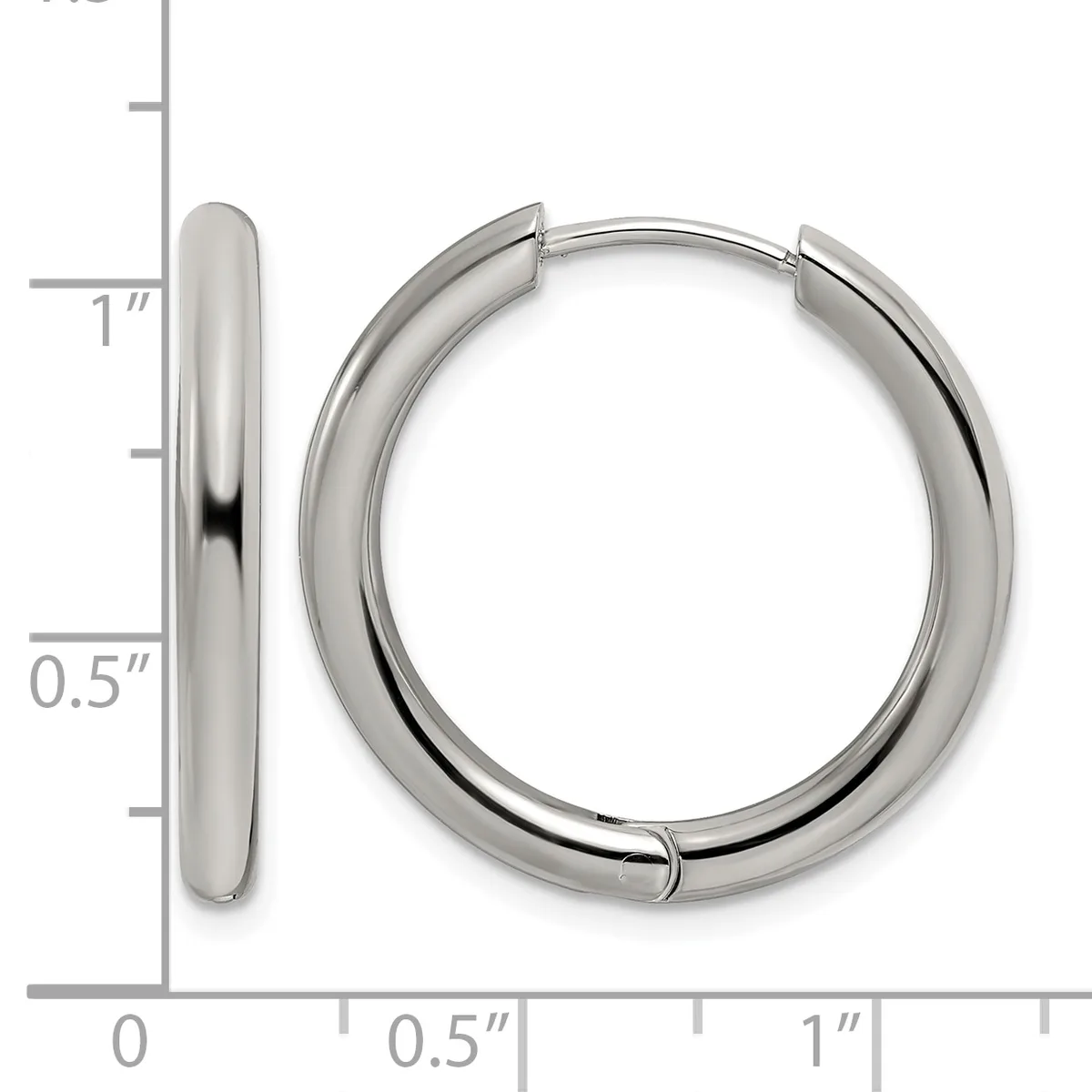 A pair of polished silver-tone hinged hoop earrings displayed next to a measurement scale showing approximately one inch in diameter and half an inch in width.