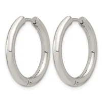 A pair of polished silver-toned chunky hoop earrings with hinged closures, shown from the front against a white background.