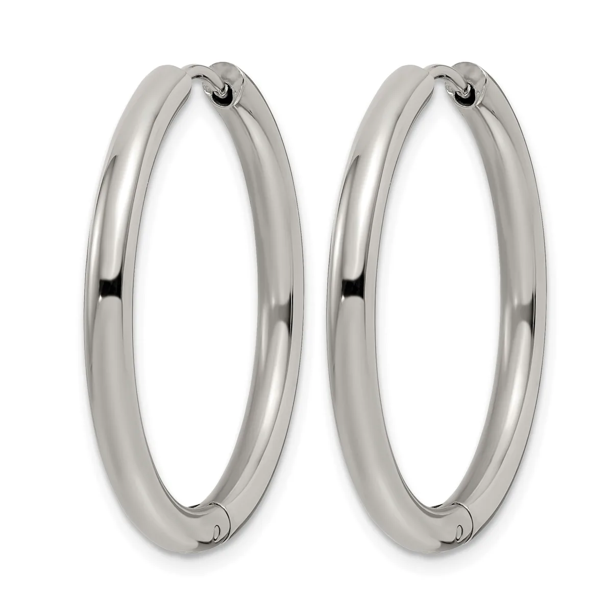 A pair of polished silver-toned hoop earrings with a rounded, tubular design and small hinged closures at the top.