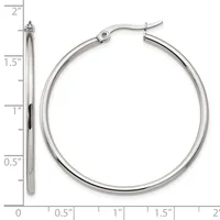A pair of polished silver-toned hoop earrings with hinged posts, displayed against a measurement scale showing approximately 1.5 inches in diameter.