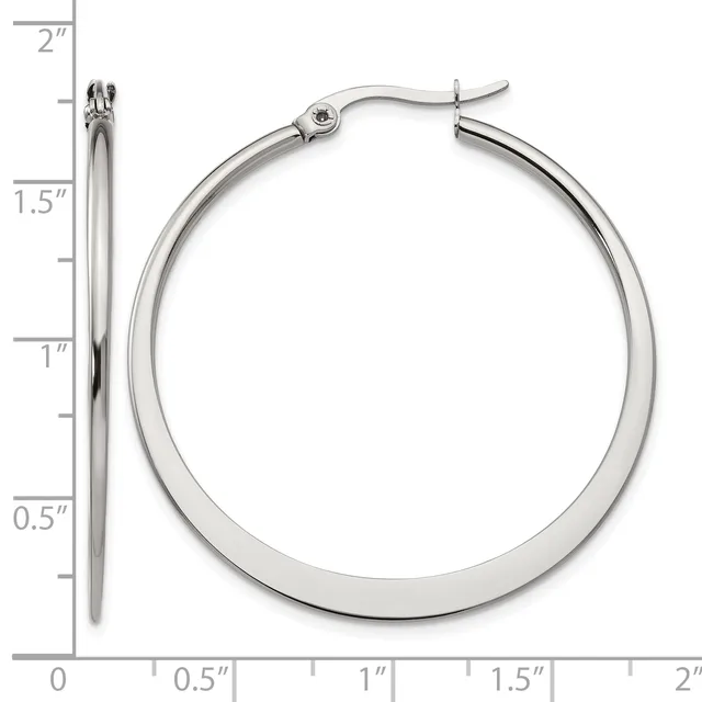 A pair of polished silver-colored hoop earrings with a measurement scale showing they are approximately 1.5 inches in diameter.