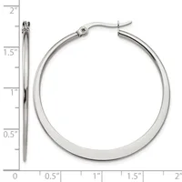 A pair of polished silver-colored hoop earrings with a measurement scale showing they are approximately 1.5 inches in diameter.