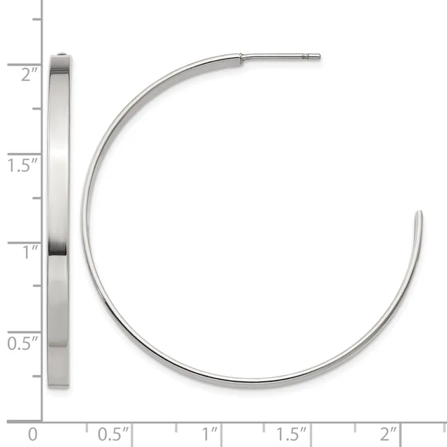 A pair of polished silver hoop earrings displayed against a measurement scale, shown from the side to indicate their curved shape and approximate dimensions.