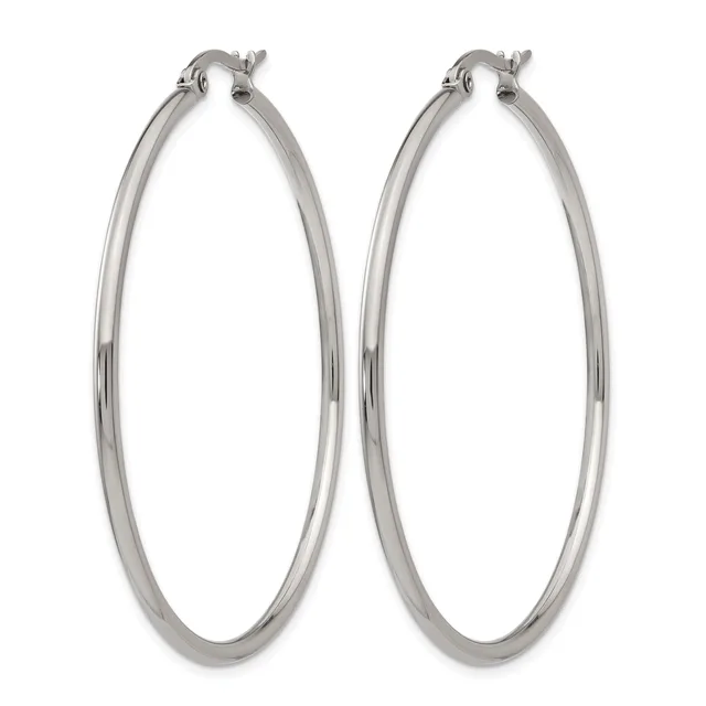 A pair of polished silver-toned hoop earrings with a smooth, rounded profile and post-and-clutch closures.