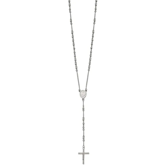A silver rosary necklace with a delicate chain, featuring a small oval medal at the center and a cross pendant hanging at the bottom.