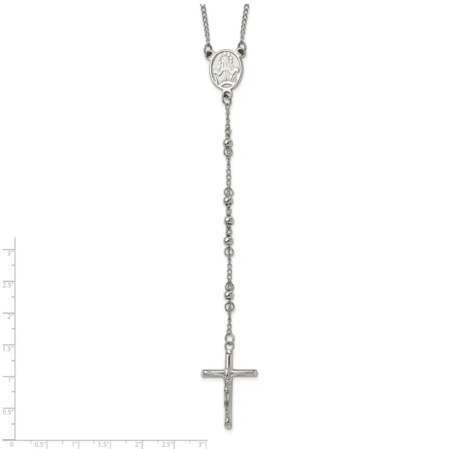 Silver rosary necklace with an oval medal at the top and a cross pendant at the bottom, shown against a measurement scale.