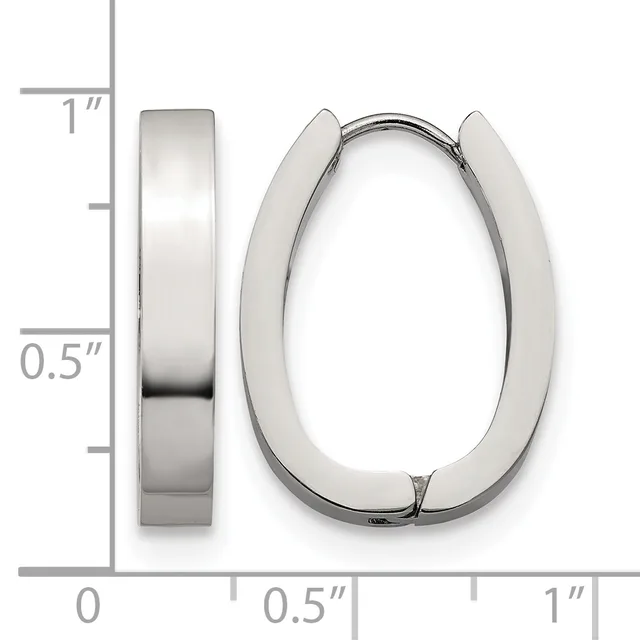 A pair of polished silver hoop earrings with a chunky oval shape, shown from front and side views against a measurement scale.