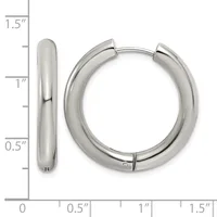 A pair of polished silver-colored chunky hoop earrings with a smooth rounded profile, displayed next to a measurement ruler showing approximately 1.5 inches in length.