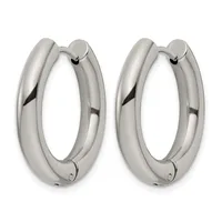 A pair of polished silver-tone chunky hoop earrings with a smooth, rounded profile and hinged closures, shown from the front.