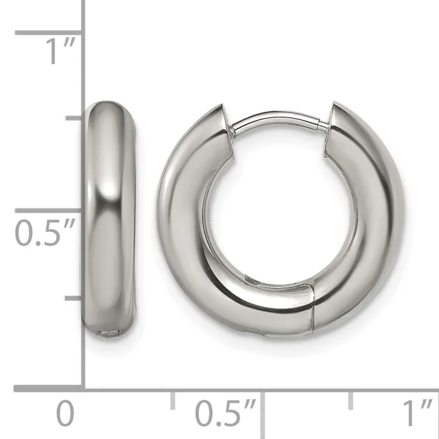 Pair of polished silver-toned chunky hoop earrings with a hinged closure, displayed against a measurement scale showing approximately 0.5 inches in width and 1 inch in height.
