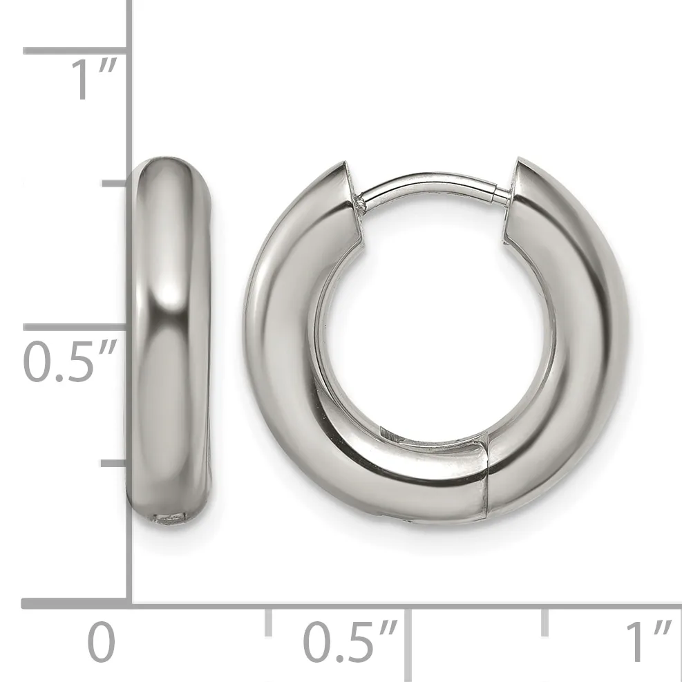 Pair of polished silver-toned chunky hoop earrings with a hinged closure, displayed against a measurement scale showing approximately 0.5 inches in width and 1 inch in height.
