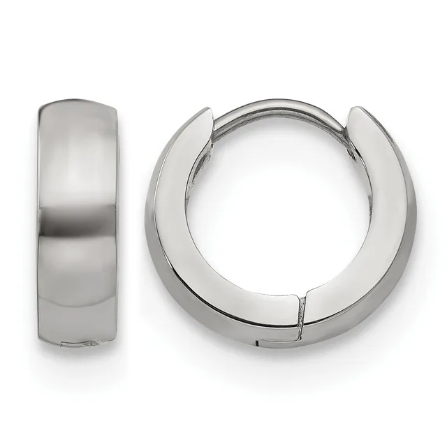 A pair of polished silver-toned chunky huggie hoop earrings shown from front and side views, featuring a hinged closure mechanism.