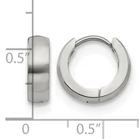 A pair of polished silver-toned chunky hoop earrings displayed against a measurement scale showing approximately 0.5 inches in width and depth.