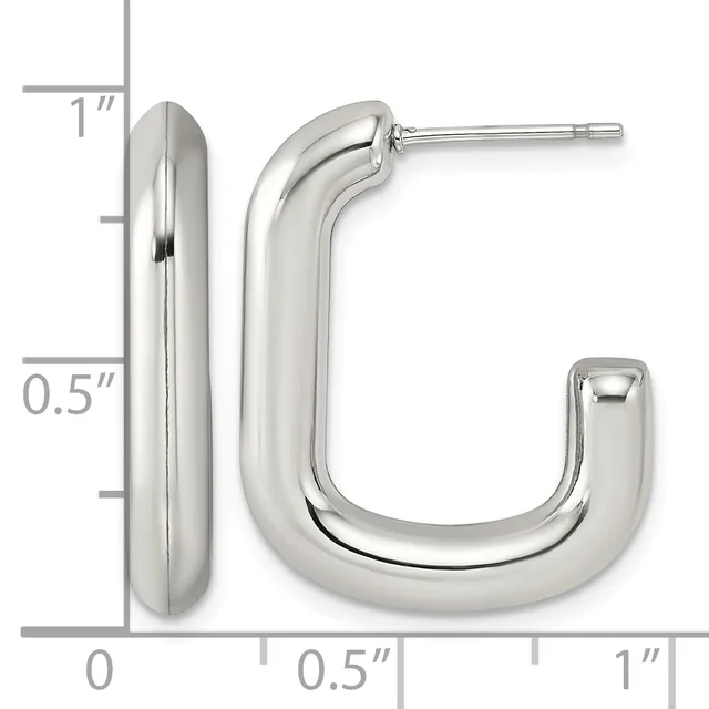 Polished silver-toned chunky rectangular hoop earrings shown with a measurement scale indicating approximately one inch in length and half inch in width.