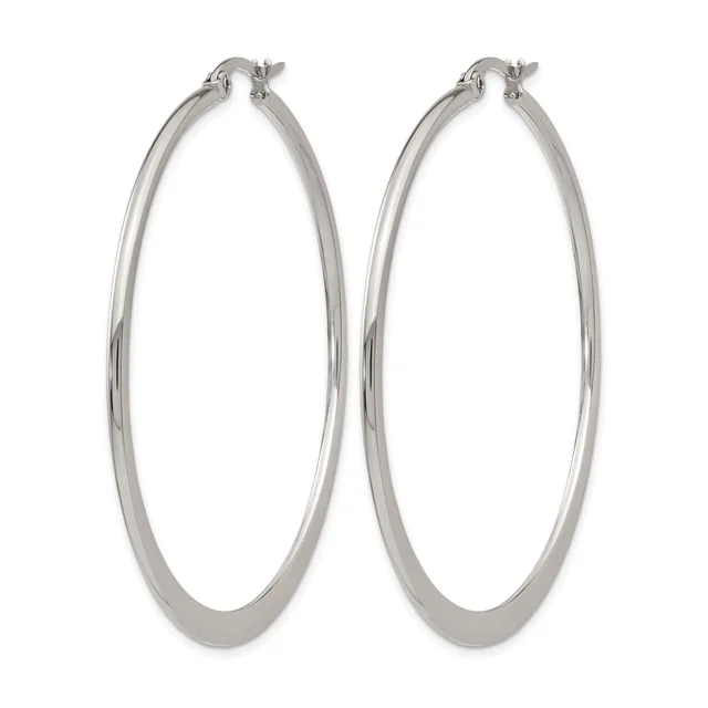 A pair of polished silver-toned hoop earrings with a thick, smooth band and hinged closures, displayed against a white background.
