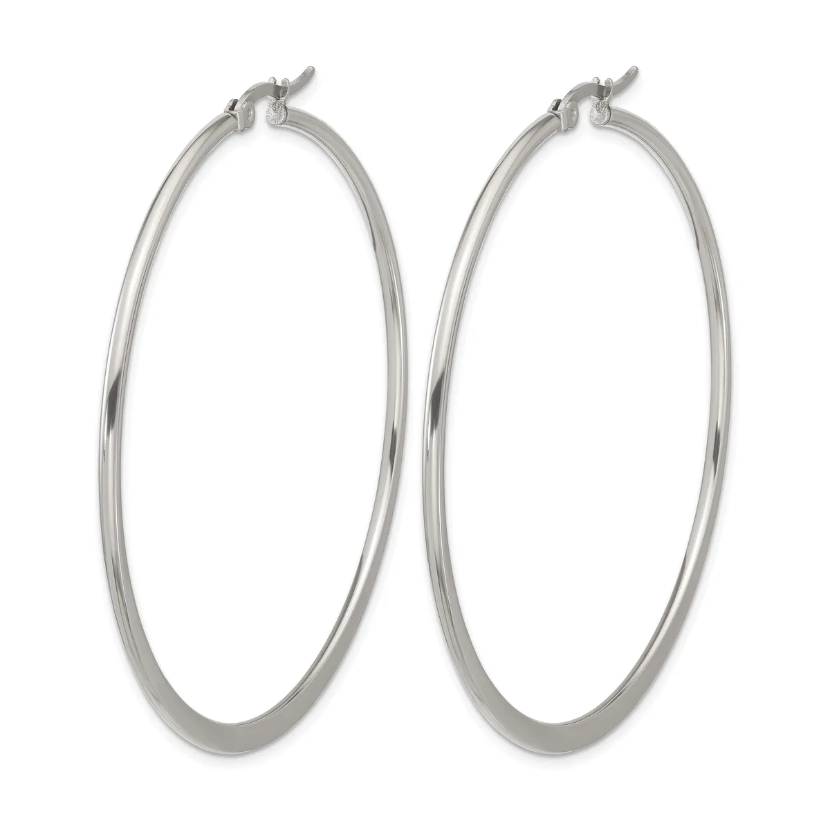 A pair of polished silver-toned hoop earrings with a smooth, rounded profile and hinged closures, displayed side by side.