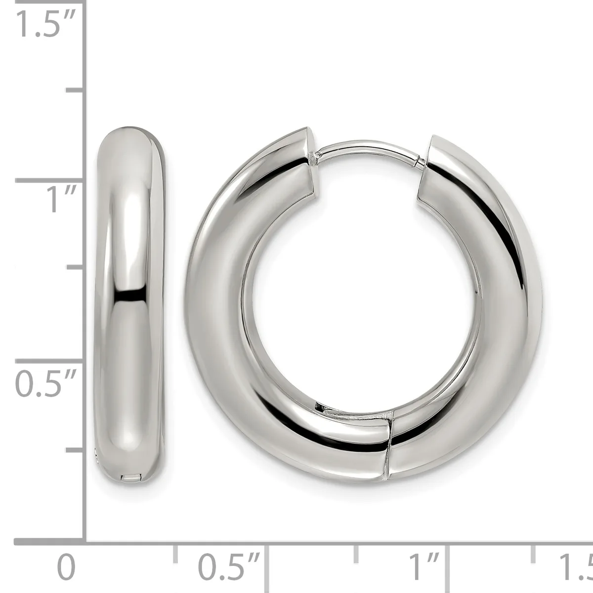 A pair of polished silver-toned chunky hoop earrings displayed against a measurement scale showing they are approximately one inch in diameter.