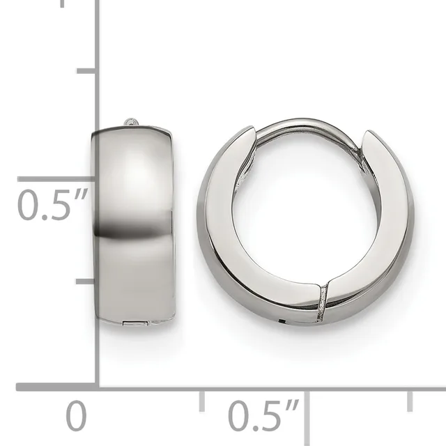 A pair of polished silver-toned chunky huggie hoop earrings shown from front and side views with a measurement scale indicating approximately 0.5 inches in height.