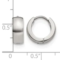 A pair of polished silver-toned chunky huggie hoop earrings shown from front and side views with a measurement scale indicating approximately 0.5 inches in height.