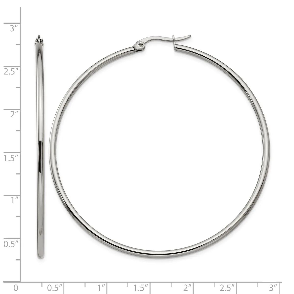 A pair of silver hoop earrings displayed next to a ruler showing their size of approximately 2.5 inches in diameter.