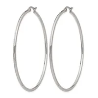 A pair of polished silver-toned hoop earrings with a smooth, rounded tubular design and hinged closures, shown against a white background.