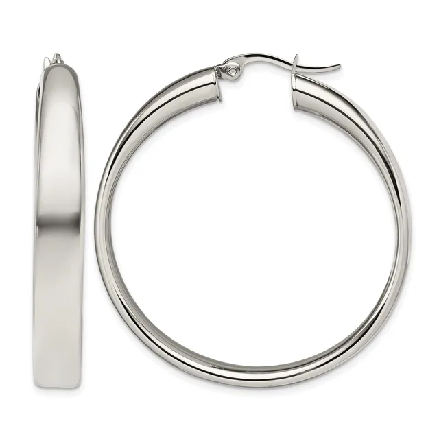 A pair of polished silver-toned hoop earrings shown from front and side views, displaying their smooth curved tubular design with hinged closures.