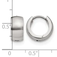 A pair of polished silver hoop earrings shown from front and side views with a measurement scale indicating 0.5 inches in height.
