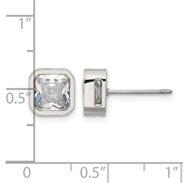 A pair of square stud earrings with bezel-set clear gemstones in polished silver metal, shown front and side view against a measurement scale.