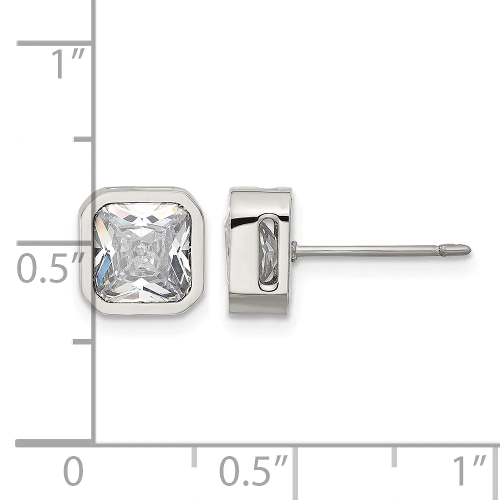 A pair of square stud earrings with bezel-set clear gemstones in polished silver metal, shown front and side view against a measurement scale.