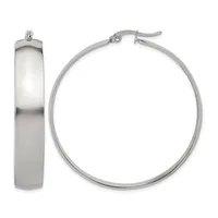 A pair of polished silver-toned hoop earrings shown from the front and side, featuring a chunky cylindrical design with a hinge and post closure.