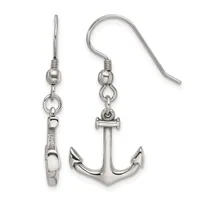 Pair of silver-toned dangle earrings with fish hook wires, one featuring an anchor charm and the other featuring a decorative clasp design.