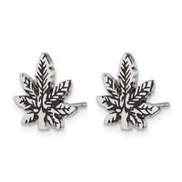 Pair of silver maple leaf stud earrings with oxidized detailing on the veins, shown from the front.