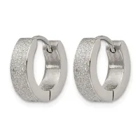 A pair of silver textured chunky hoop earrings with a frosted finish and hinged closures, shown from the front.