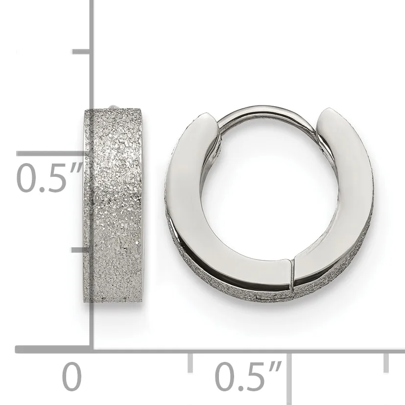 Pair of textured silver hoop earrings with a half-inch width, shown front and side view against a measurement grid.