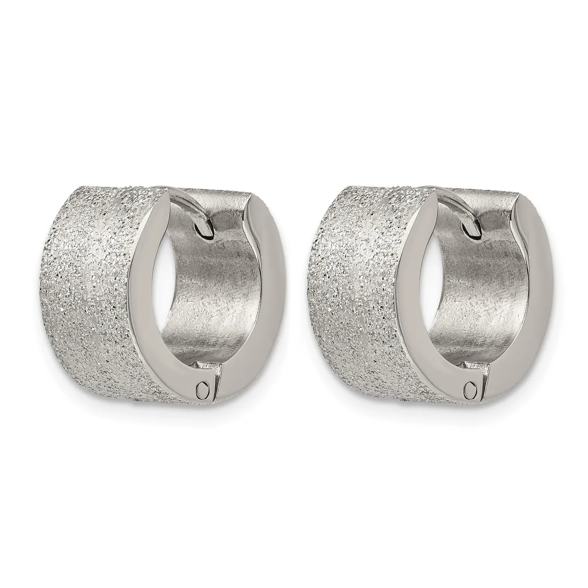 A pair of chunky silver huggie earrings with a textured surface and hinged closures, shown from the front.