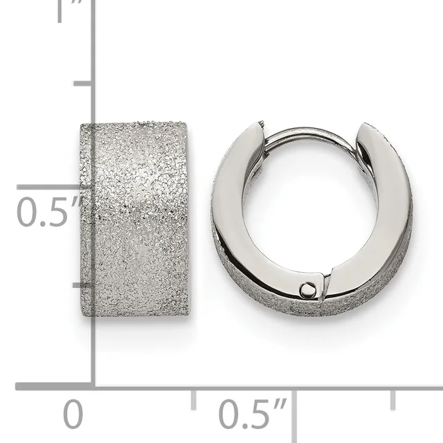 Two stainless steel textured hoop earrings displayed next to a measurement scale showing them to be approximately 0.5 inches in diameter.