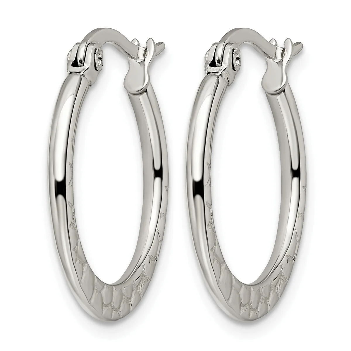 A pair of polished silver oval hoop earrings with textured bases and hinged closures, displayed against a white background.