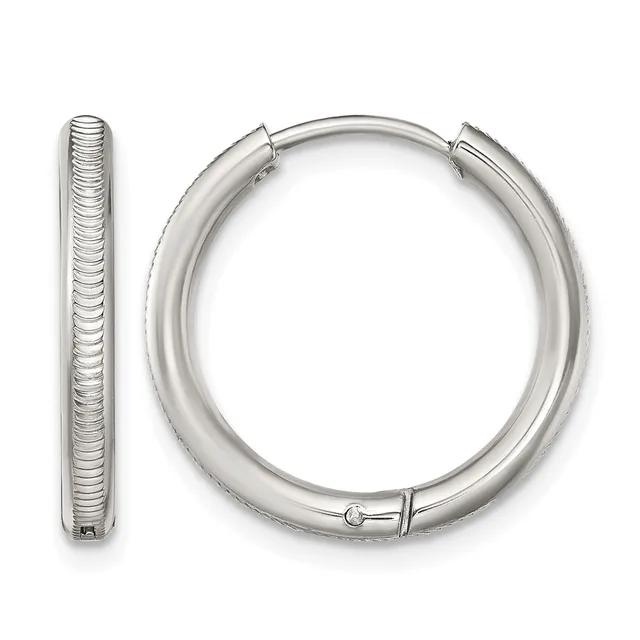 A pair of polished silver hoop earrings with textured surface detail, shown from front and side views.