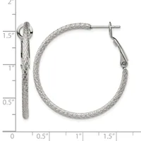 A pair of silver hoop earrings with a textured woven mesh finish, displayed against a measurement scale showing they are approximately 1.5 inches in diameter.