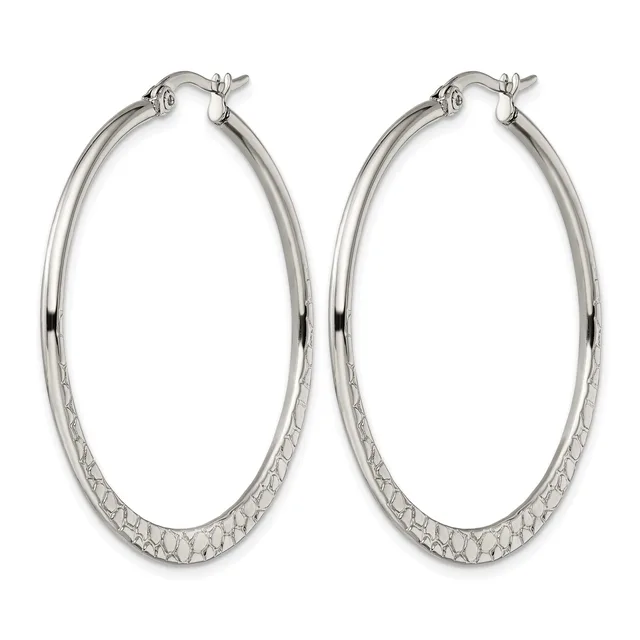 Pair of silver-tone oval hoop earrings with textured lower halves and polished upper sections, featuring post and clutch closures.