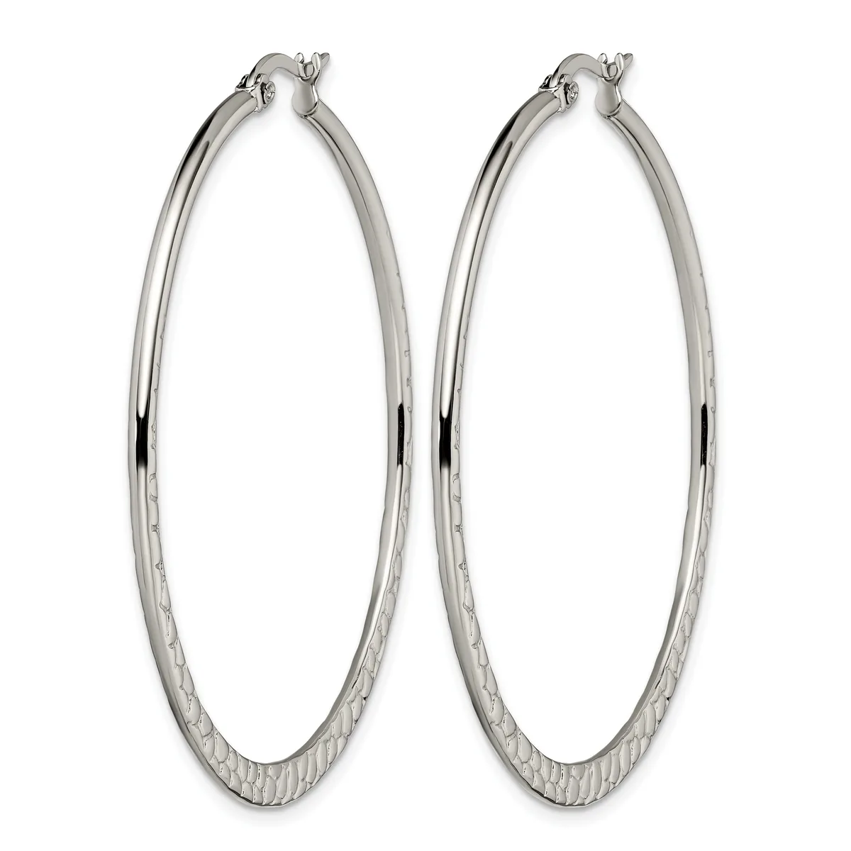 A pair of large silver-toned hoop earrings with a textured lower half and polished upper half, displayed against a white background.